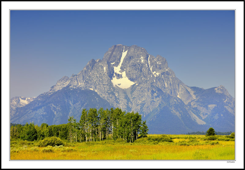 Mount Moran And Skillet Glacier Shimmer In Morning Haze