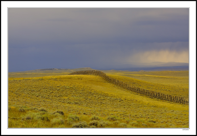 Boundless Miles Of Snow Fence Snake Across Wyoming Range