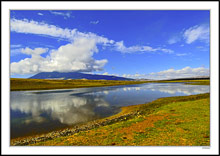 Elk Mtn Reservoir Reflects Clouds Above Its Namesake - Wyo