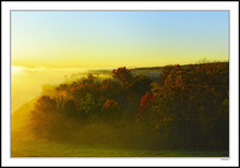 Sunrise Electrifies The Rising River Mist