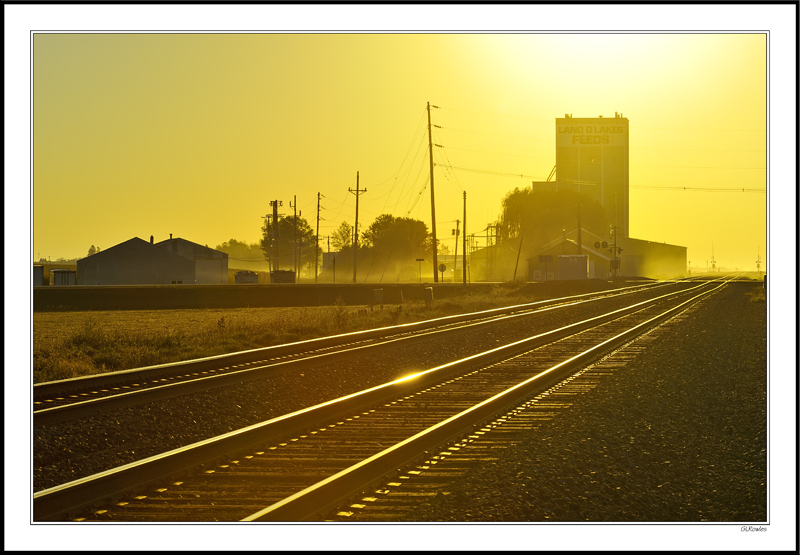 Shimmering Rails and Misty Sunrise I