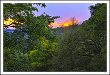 Pastel Sunset Across The Wooded Valley