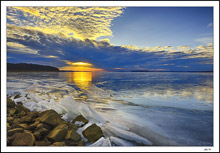 Sunrise Tunnels Beneath An Encroaching Cloud Bank