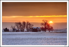 A Brief Glimpse Of Sunrise Between The Clouds