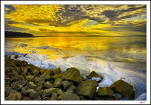 Sunbeams Filter Through Clouds Bathing Lake In Golden Glow