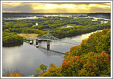 Dawn Breaks Through The Autumn Haze At Black Hawk Bridge